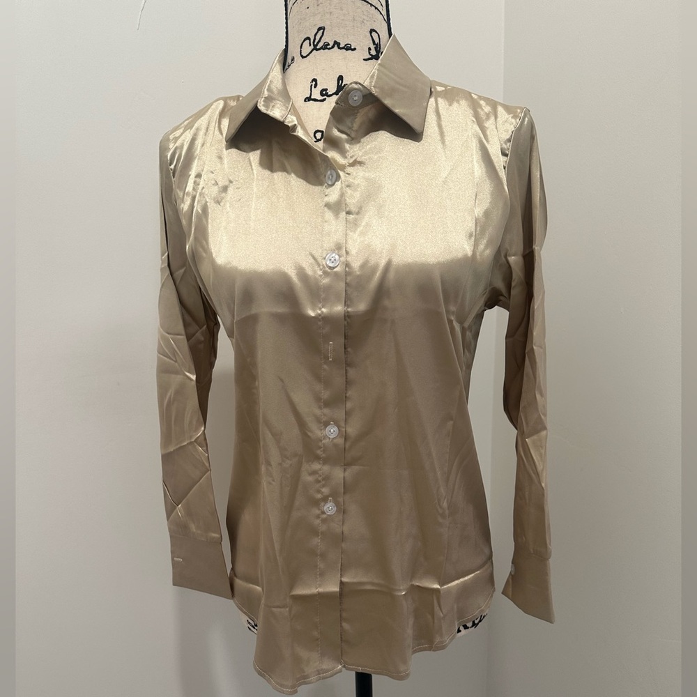 NEW Women’s silk blouse. Size M. Shoulder to cuff is 20 inches. New. Never worn
